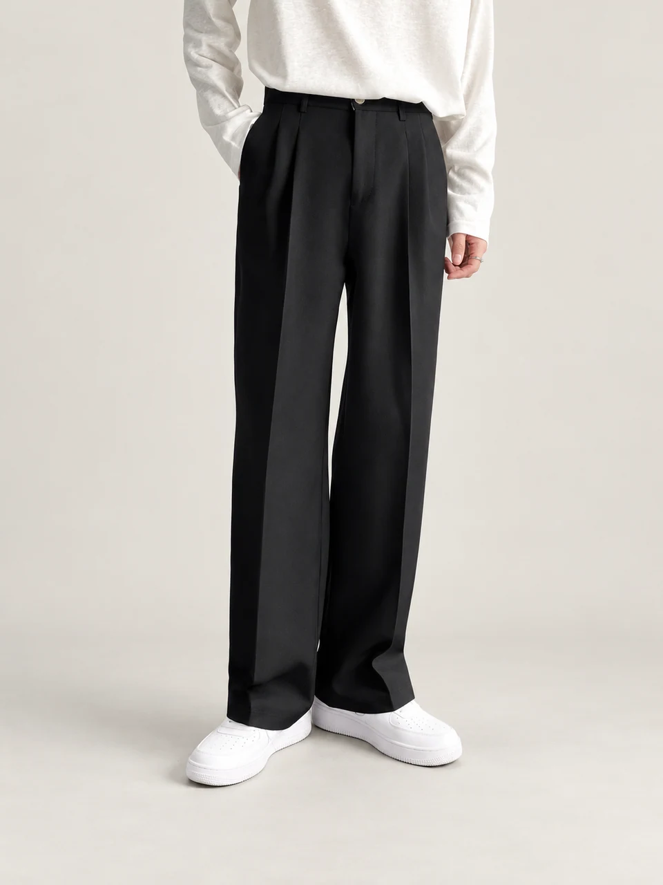 Bennett Pleated Trousers — Black — product photograph